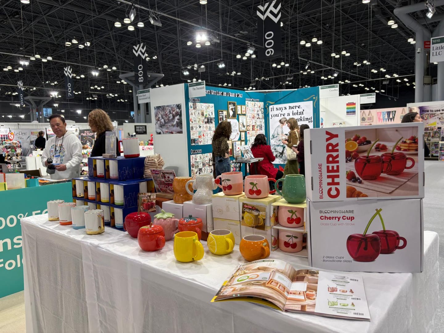 Bloomingware booth with Cherry Cups, city mugs, and fruit mugs
